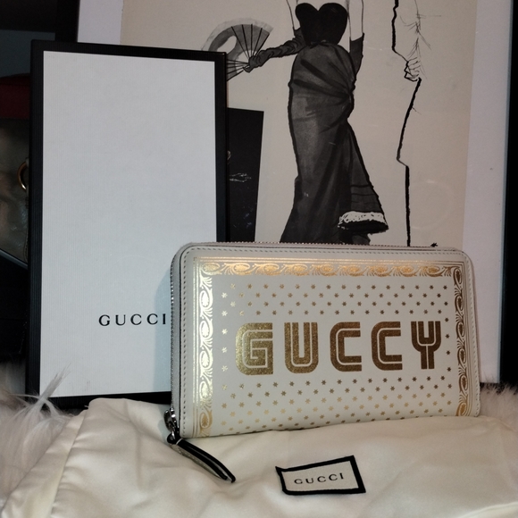 Gucci Handbags - Like New Gucci X SEGA Calfskin GUCCY Stars Zip Around Wallet.